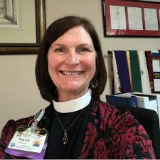 Travis Greenman describes her role as Chaplain at Patriots Colony as  spiritual wellness. Unlike being a pastor with a set congregation, her role  at Patriots Colony needs to address many different faith