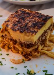 The Meaning Of Mykonos Mykonos Greek Dishes Greek Lasagna