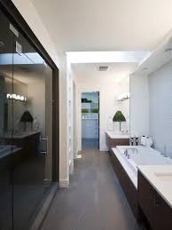 Our first design for the room clad the entire vanity wall in dark wooden cabinetry. 9nyj3 O8io2twm
