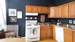 Diamond cabinets, sullivan full overlay door style, maple in harvest stain. This Is How To Deal With Honey Oak Cabinets Paint The Walls Midnight Blue Kitchn