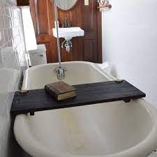 This is one place where diy bathroom ideas are only limited by your imagination. Ebonized Tub Caddy By Pegandawl On Etsy Wood Bathtub Bathtub Caddy Tub Caddy
