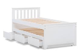 Twin size trundle bed in white, with drawers and open shelves bookcase headboard stylized as a doolhouse roof. White Captain Jack Single Trundle Bed Amart Furniture