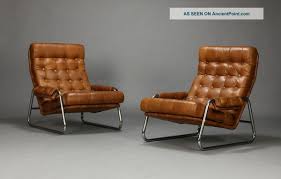 Pair of mid century danish modern lounge arm chair in teal blue. Modern Leather Lounge Chair Leather Lounge Danish Leather Lounge Chair