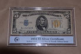 These notes include an additional legend printed on the face that is not present on any other federal reserve notes. 1934 5 Silver Certificate Yellow Seal Wwii North Africa Issue Property Room