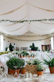 This Portnahaven Hall Wedding Went Totally Natural By Decorating With Potted Plants Junebug Weddings Wedding Plants Potted Plant Centerpieces Herb Wedding