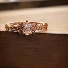 Nature Inspired Custom Wedding Ring Pear Shape Center Rose Gold Engagement Ring With A Leafy Natu Engagement Rings Opal Custom Wedding Rings Wedding Rings