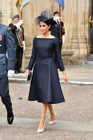 Meghan Markle Basically Rewore Her Wedding Dress In Black Meghan Markle Outfits Stunning Dresses Meghan Markle Style