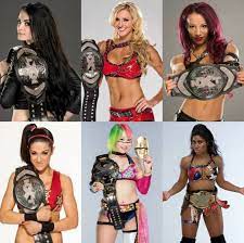 Nxt Women S Champions Paige Charlotte Sasha Banks Bayley And Ember Moon Wwe Girls Wwe Womens Wwe Female Wrestlers