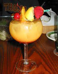 Combine all ingredients except the fresh fruit in a large container; Peach Sangria From The Olive Garden I Was Expecting A Glass Of Wine Because I Did Not Look At The Drink Menu So Liquor Recipes Peach Sangria Yummy Drinks