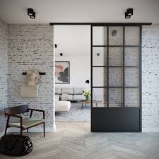 La Porte Coulissante Style Atelier D Artiste Dans Un Interieur Contemporain Porte Coulissante Atelier Portes De Placard En Verre Portes Vitrees Interieures