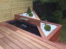 Terrasse En Bois Exotique Padouk Et Dalles Gres Cerame Amenagement Jardin Decoration De Terrasse Exterieure Terrasse Bois