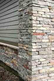 Many homeowners use a stacked stone veneer along their fireplace or exterior wall. Chilton Ledgestone Exterior Stone Veneer Buechel Stone Building Stone Stone Masonry Stone Veneer