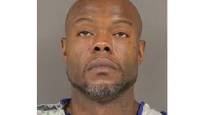 Man facing accessory to murder charge taken into custody after standoff  with US marshals