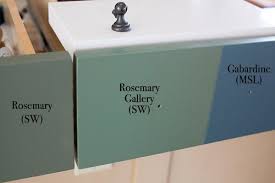 Add a shiplap wall in the living room and paint it a bright white. Rosemary Gallery Kitchen Island Color The Lettered Cottage Martha Stewart Paint Painting Bathroom Cabinets Paint Colors For Home