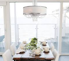 Replacing an old chandelier with a fresh new modern light can update your lighting design in an instant. Allure Crystal Chandelier With Silk Drum Shade Contemporary Dining Room New York By We Got Lites Houzz
