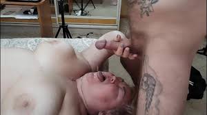 cum on the face and in the mouth after manual penis stimulation from a fat  woman