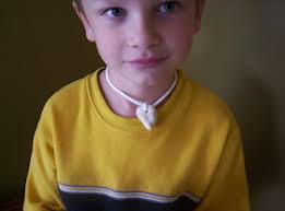 Almost Unschoolers: Salt Clay Dinosaur Tooth Choker