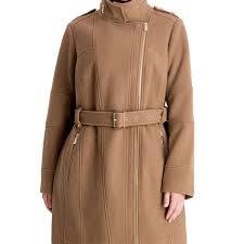 The michael michael kors asymmetrical belted coat is designed with a notched collar and asymmetrical front closure, as well as bright gold hardware that adds a bit there's a stunning ivory tone that screams snow queen to us, though the classic camel shade is the most trendy of the bunch. The 14 Best Plus Size Winter Coats Of 2021