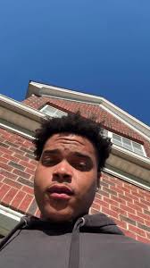 Man Pushing The Lawnmower with Cowboy Boots