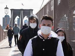 Young businessman wearing face mask during coronavirus outbreak. Who There Is No Need For Healthy People To Wear Face Masks
