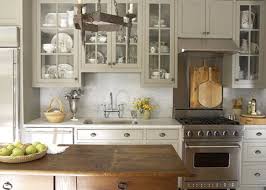 Grey Or Putty Cabinets On Cream Colored Walls Backsplash Cream Or Sand Colored Counters Dark Wood Accen Eclectic Kitchen Kitchen Remodel Kitchen Inspirations
