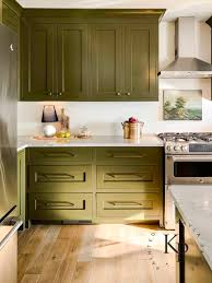 I'm excited to share the full room tour of our modern olive green kitchen with stacked tile, light wood details and matte bla. Olive Green Kitchen Cabinets Painted By Kayla Payne Green Kitchen Cabinets Green Kitchen Furniture Olive Green Kitchen