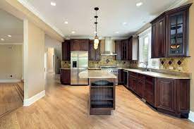 Flat panel doors are simple and trendy and don't have some high details. Dark Kitchen Cabinets Look Absolutely Stunning Get Some Great Ideas And View Our Pictures Of Kitchens W Dark Kitchen Cabinets Dark Wood Kitchens Wood Kitchen