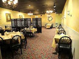 The green light is situated in a secret room, that lies in what was once an architect's office. 20 Raleigh Hidden Gems And Long Standing Restaurants Worth Supporting Walter Magazine