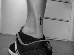 The colour shades used also reflects well on the wearer. Stick And Poke Tattoo Hand Poked Christian Cross Tattoo On The Achilles
