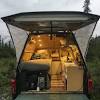 Camping in the back of a truck. Https Encrypted Tbn0 Gstatic Com Images Q Tbn And9gcqj7l7oe5aq8xctqvk2kkk1jqxwj0nqwcjynihmkdxqkd2fxoua Usqp Cau