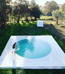 In places around the pool the cool deck has flaked off and i can see the bare concrete. Home The Cool Hunter Journal Cool Pools Round Pool Small Swimming Pools