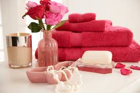 pamper perfect bathroom with lofty towels fresh flowers and scented candles bedbathntable bathroom accessories design bath n bathroom collections