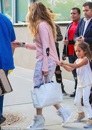 When jennifer goes up to give him a high five, he goes from black and white to bright colors that delight him. Jennifer Lopez Takes Six Year Old Twins Max And Emme Out Daily Mail Online