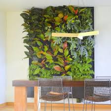 An indoor vertical garden, also known as a green or living wall, is a garden grown vertically against a wall. Vertical Gardens Diy