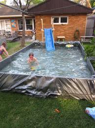 The Dirt Effect The Latest Diy Swimming Pool Pool Slide Diy Backyard Pool