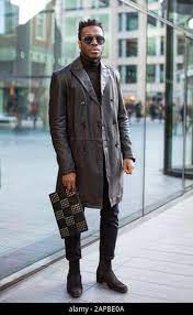 Full Body Street Portrait Of Stylish Handsome Black Man Wearing Sunglasses Black Leather Trench Coat Instagram Fashion Blogger Look With Mr Stock Photo Alamy