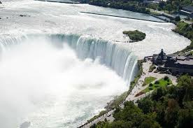 In some versions of the buck rogers franchise, earth's capital city is located at niagara and/or buck has his headquarters behind the actual falls. Aerial View Of The Canadian Horseshoe Falls By Niagara Falls Tourism Picture Of Niagara Falls Ontario Tripadvisor