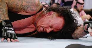 Former WWE Superstar reveals identity of masked man involved in  controversial Undertaker segment leading to a firing