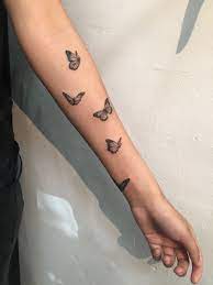Butterfly Tattoo Flying Up Arm By Lianna At Black And Blue Tattoo Around Arm Tattoo Tattoos Pretty Tattoos