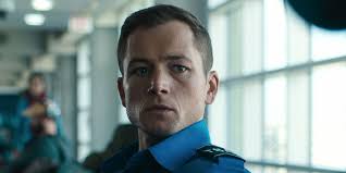 Which Stars Are Sounding the Security Alarms in Netflix's Christmas Action  Movie, 'Carry-On'?