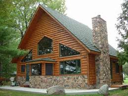 The advantages over full logs are exceptional. Heart Pine Floors Southern Wood Specialties Log Cabin Siding Knotty Yellow Pine Manufacturer Direct Log Cabin Exterior House Exterior Cabin Exterior
