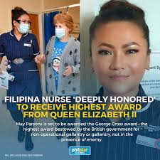 FILIPINA NURSE TO RECEIVE GEORGE CROSS AWARD Filipina May Parsons, the  nurse who administered the world's first COVID-19 vaccine
