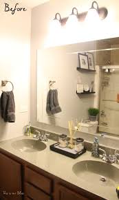 A new vanity is an easy bathroom makeover. Simple Bathroom Vanity Light Fixture Update This Is Our Bliss