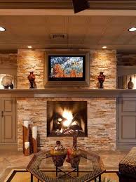 Stone Fireplace With Ceiling Accent Lights Basement Design Basement Fireplace Basement Remodeling