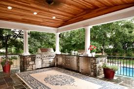 Amenities include a full outdoor kitchen, masonry wood burning fireplace and porch swing. Luxury Outdoor Living Kane Landscapes Outdoor Kitchen Design Outdoor Pavilion Backyard Pavilion