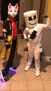 Jump up and down while swinging it aimlessly for the newbie in the lobby. My Kids Drift And Dj Marshmello Costumes Masks Made By Me Clothes Were Thrifted And I Made The Embellishments And Accessories Fortnitebr