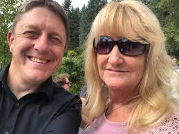 Mildred the swan not too happy about sharing her bag of seeds.