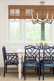 Navy Chinoiserie Dining Chairs Faux Bamboo Farmhouse Table Sisal Rug Woven Blinds Choros Chandelier Shabby Chic Dining Room Shingle Style Cottage Table