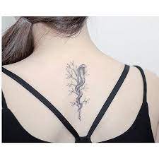 Fabulous Small Tree And Snake Tattoo On Girl Spine Tattoos On Back Snake Tattoo Snake Tattoos Feminine