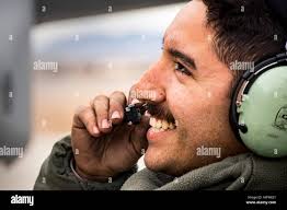 A crew chief communicates with a pilot while launching aircraft from Moron  Air Base, Spain in support of Operation ENDURING FREEDOM. Subject  Operation/Series: ENDURING FREEDOM Base: Moron Air Base State: Sevilla  Country: